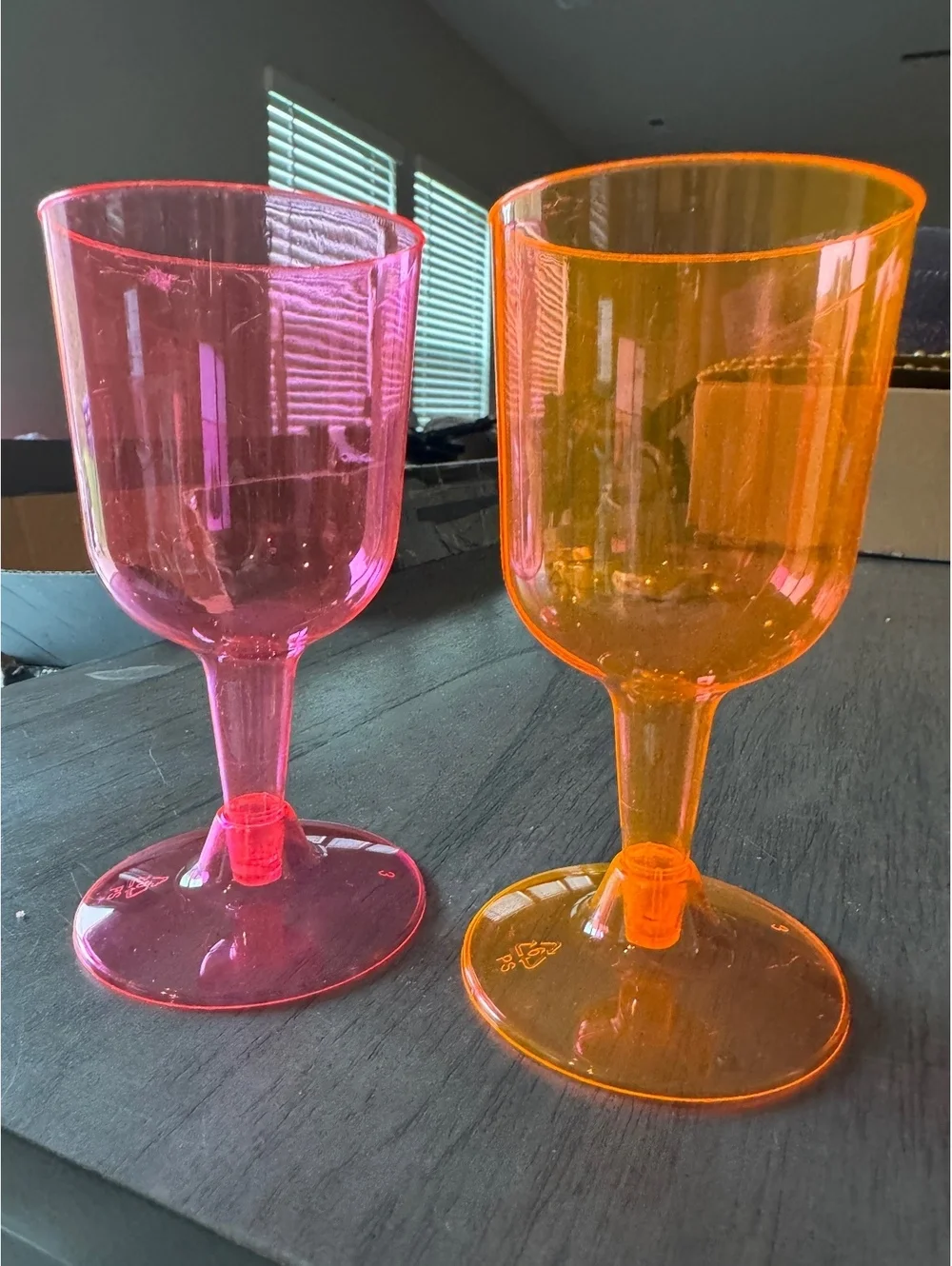 23 plastic goblets orange and fuschia NIB